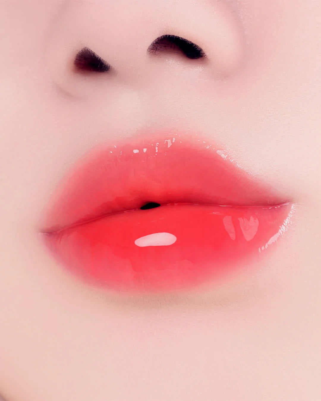 JUICY BERRY PLUMPING LIP OIL 15 CORAL SODA